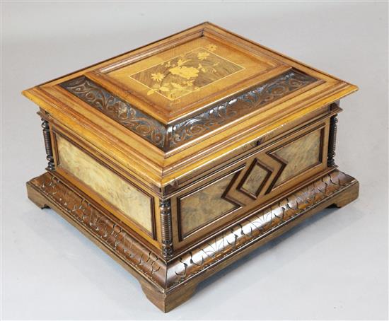 A 19th century walnut cased Polyphon musical box, with thirty six 15.5 inch discs, width 21.5in.